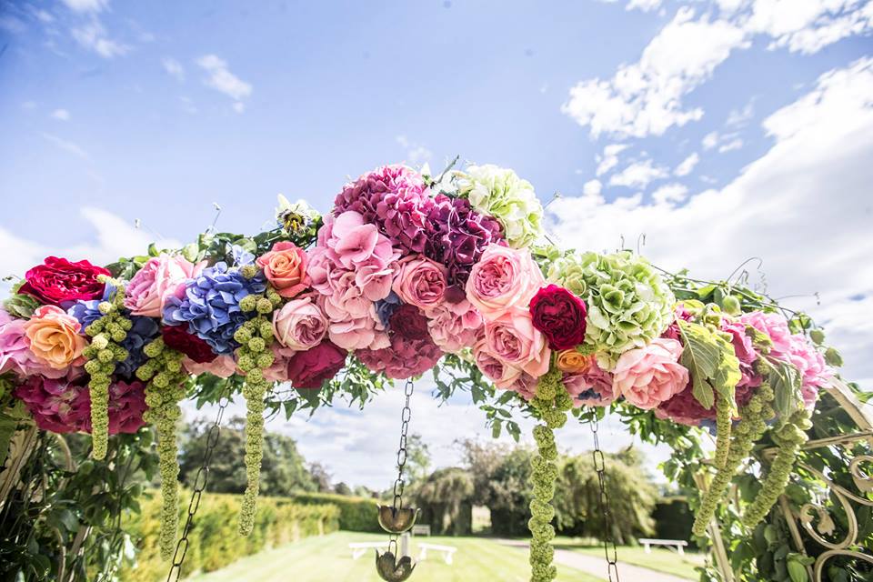 bright-floral-rose-arch-belsflowers-Sean-Elliott-photography